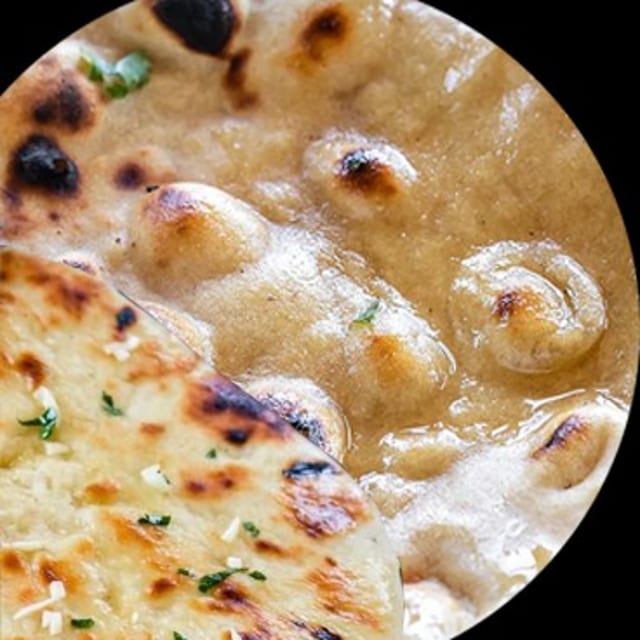 Naan or tandoori roti.